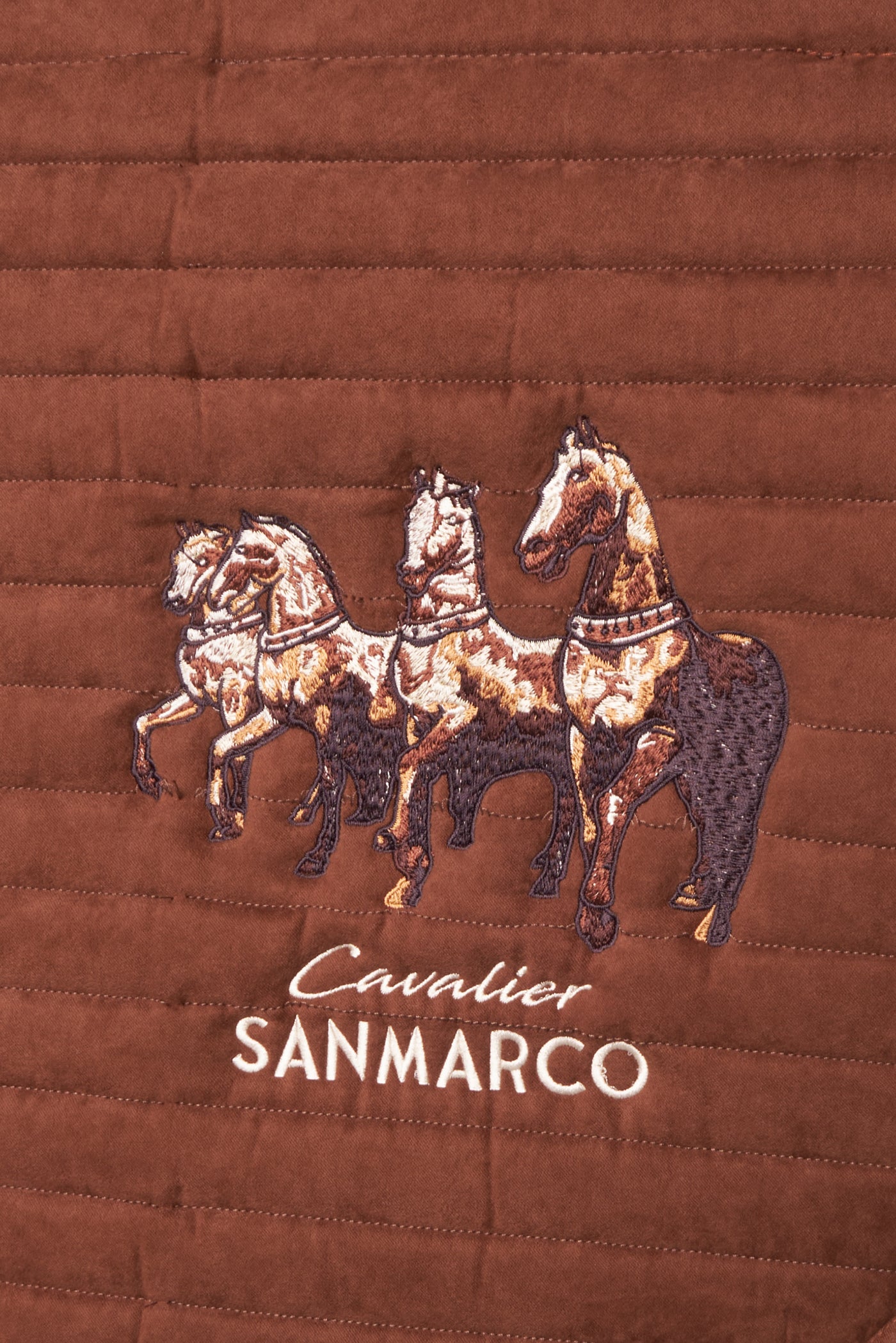 MANCHESTER SADDLE PAD ROWS LATTE SUEDE